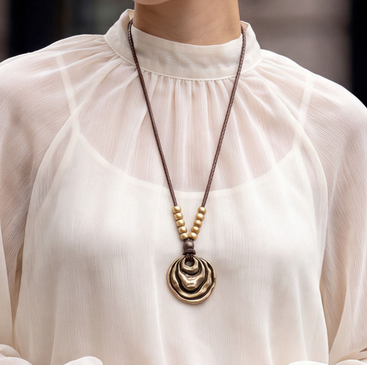 Bronze Ripple Pendant Necklace photo 1