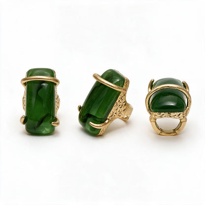 Gold ring with green stone photo 1